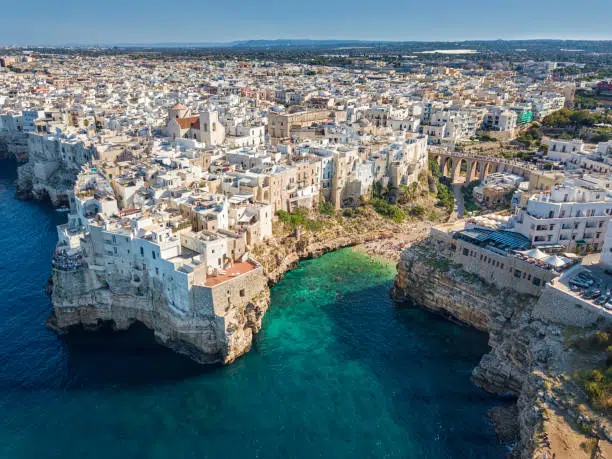 Aerial view of Polignano a Mare town and beach in Bari Province, Puglia, Italy