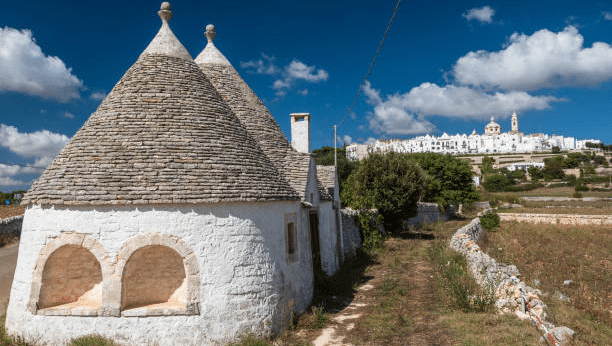 Traditional trulli houses in front of the village
